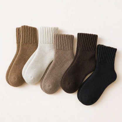 Les 5 bas Jurelo alignés : caramel, crème, taupe, espresso et noir
